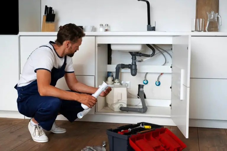 plumbing-professional-doing-his-job Plumbing professional doing his job